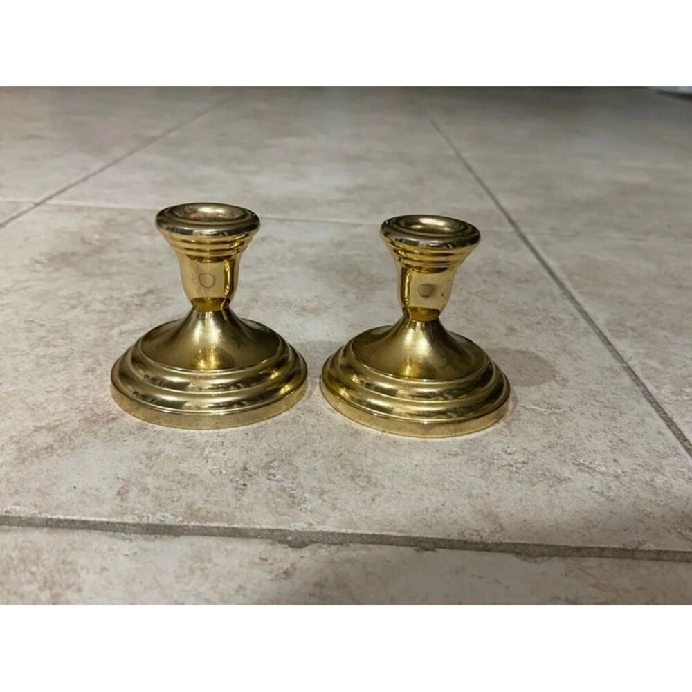 Pair of silver plated brass colored candle stick holders